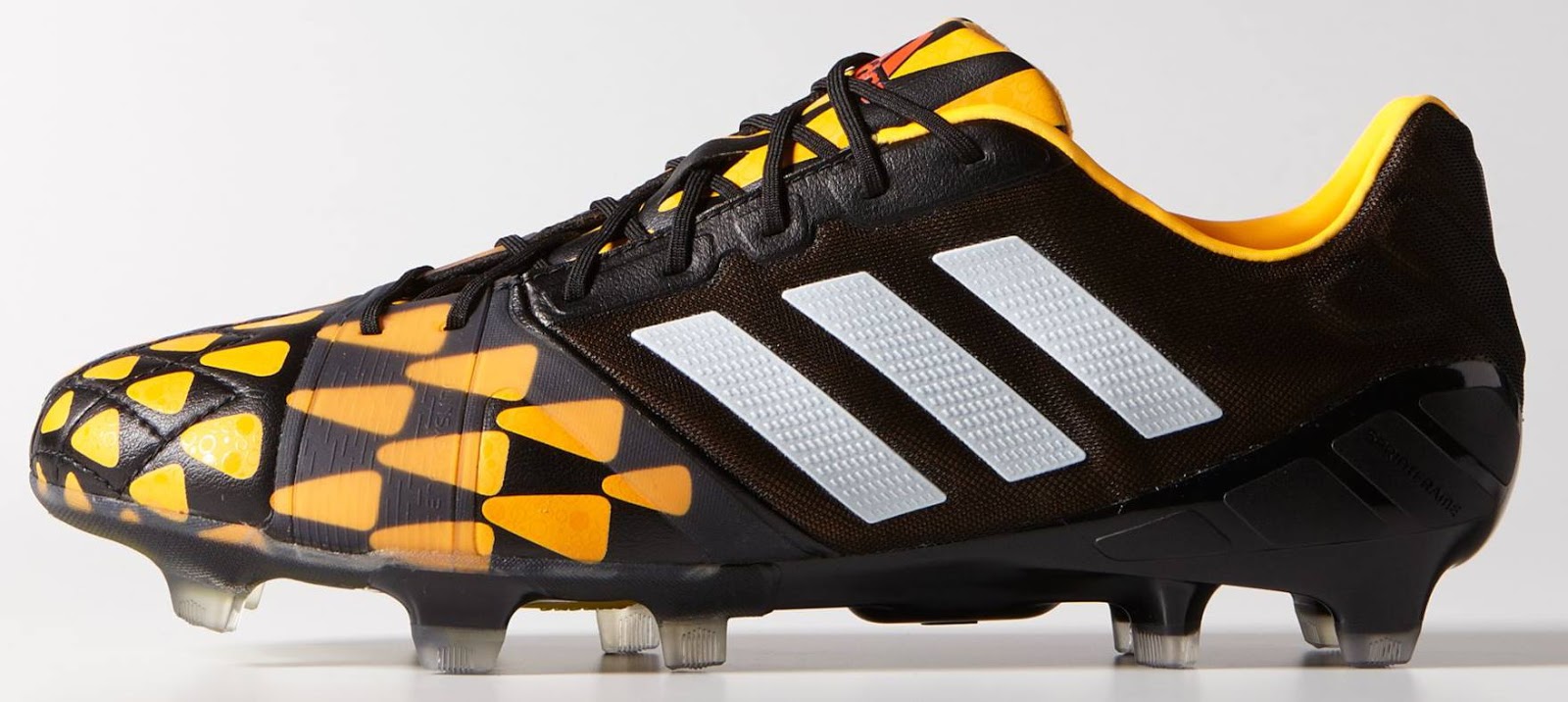 Yellow and black football top boots